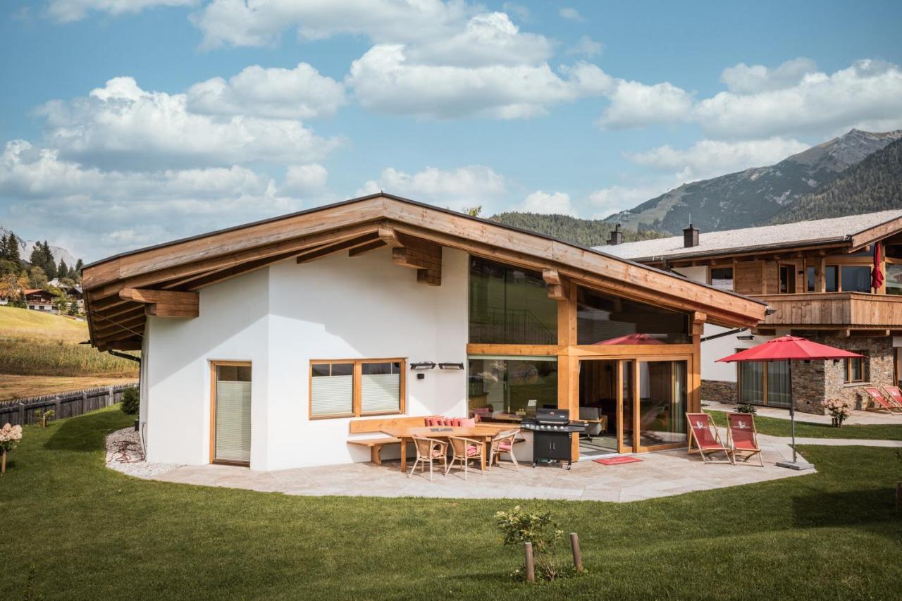 Loewen Chalets เซเฟลด์ อิน ทิโรล ภายนอก รูปภาพ